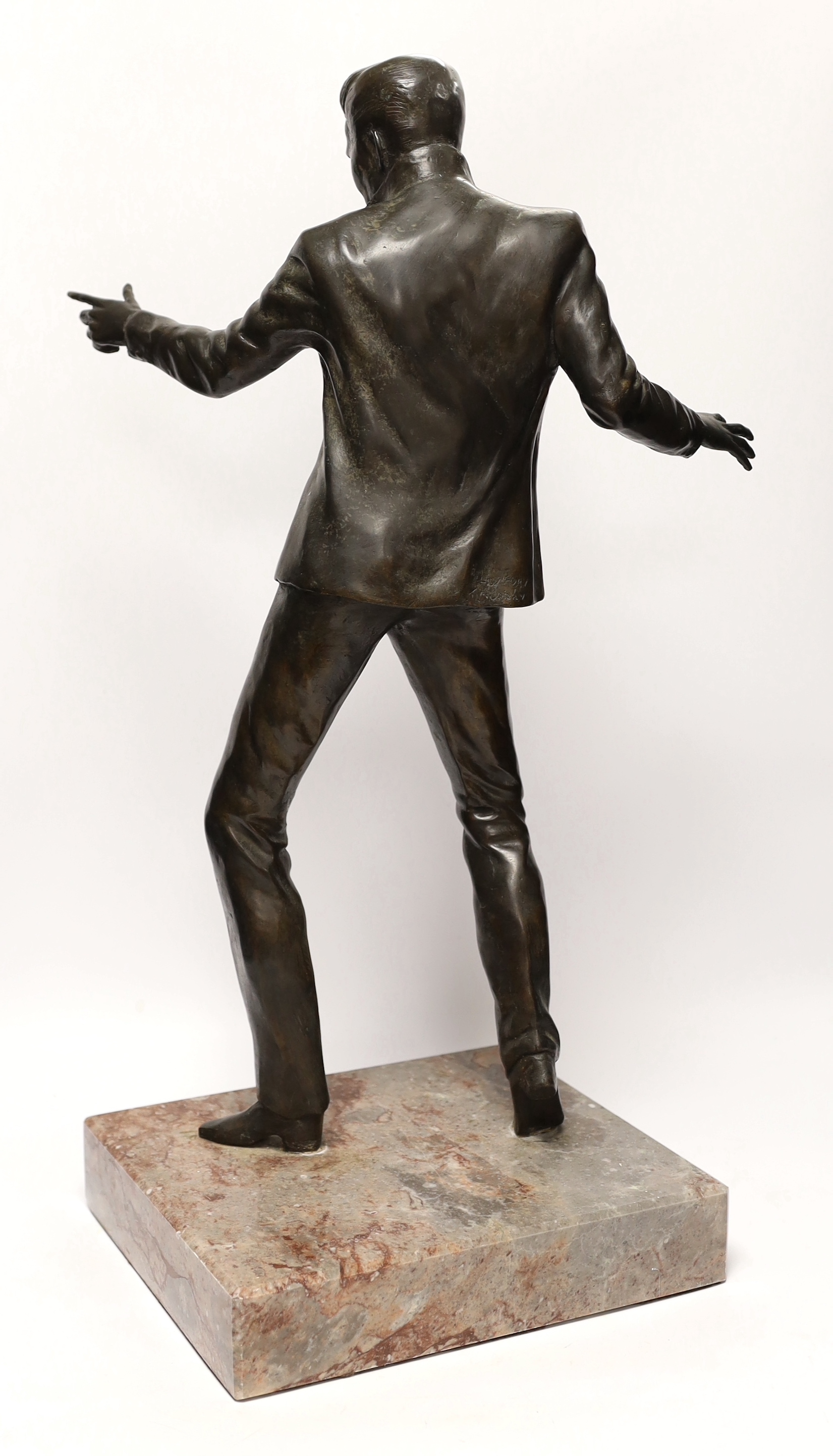 A bronze statue of Billy Fury, one of five cast by Tom Murphy, based on the public statue at the Albert Dock, Liverpool, together with a limited edition plaque, produced and sold to raise money to fund the installation o